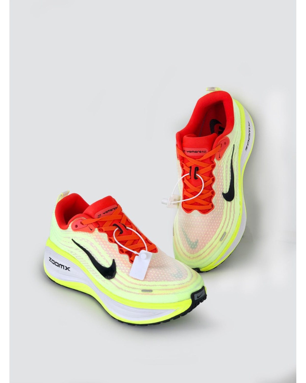 Nike Vomero Plus "Orange Volt"